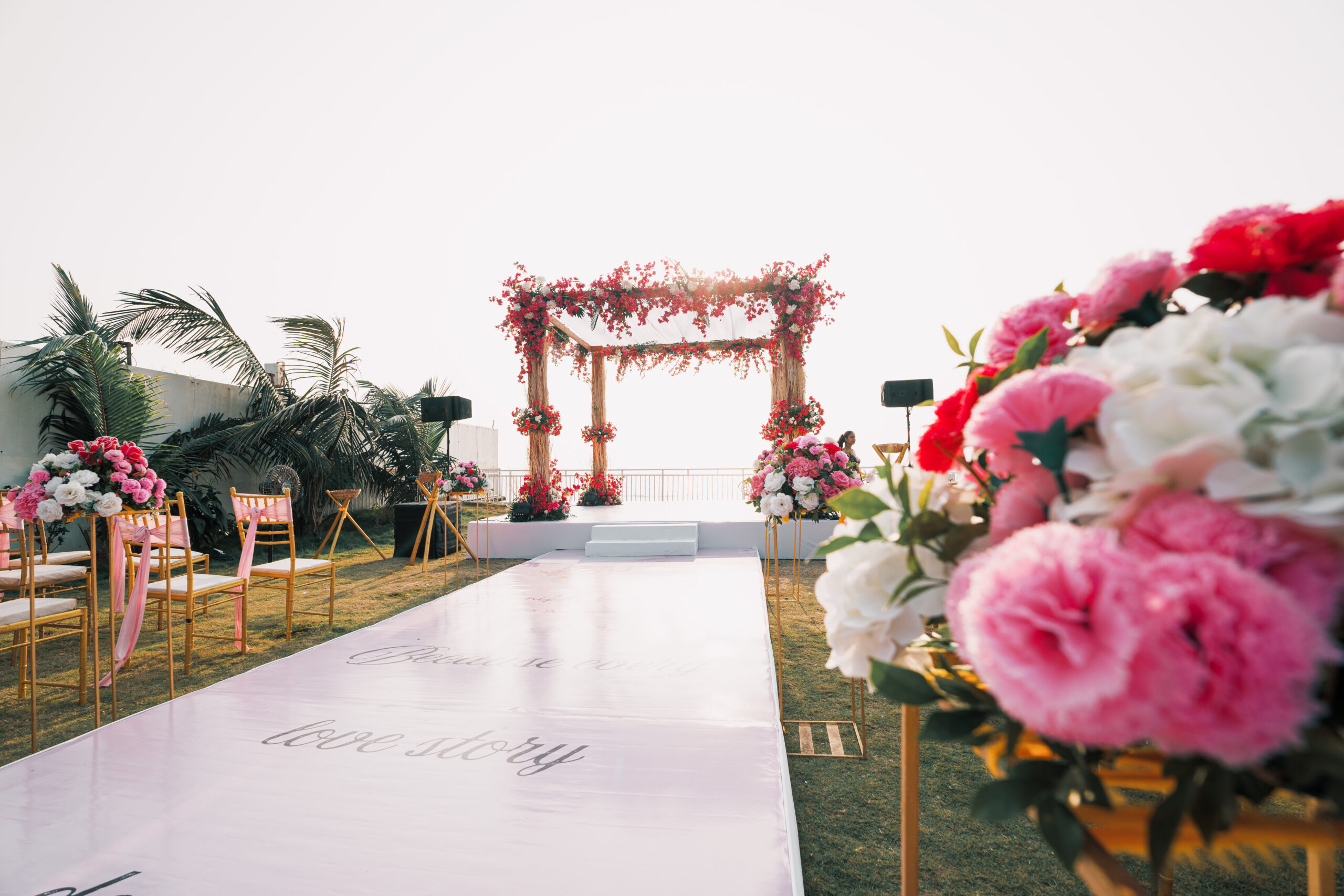 Elegant and custom made wedding aisle decor leading to the Indian Wedding Ceremony Stage