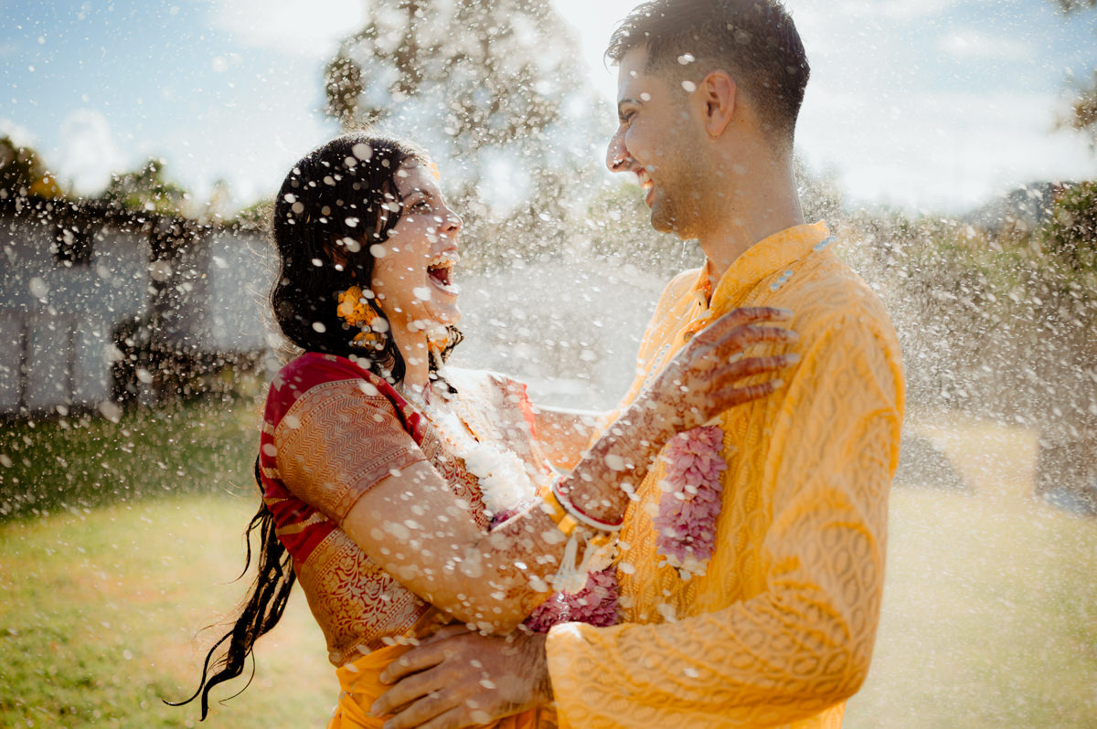 A newly wed couple beaming with joy at their Destination Wedding In Goa